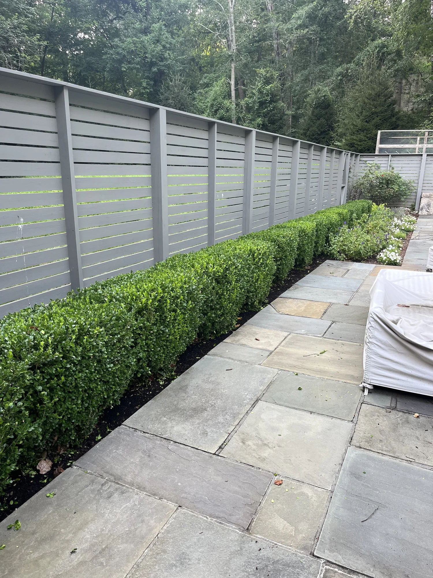 Planting bed and lawn maintained by O'Dell Landscape Services